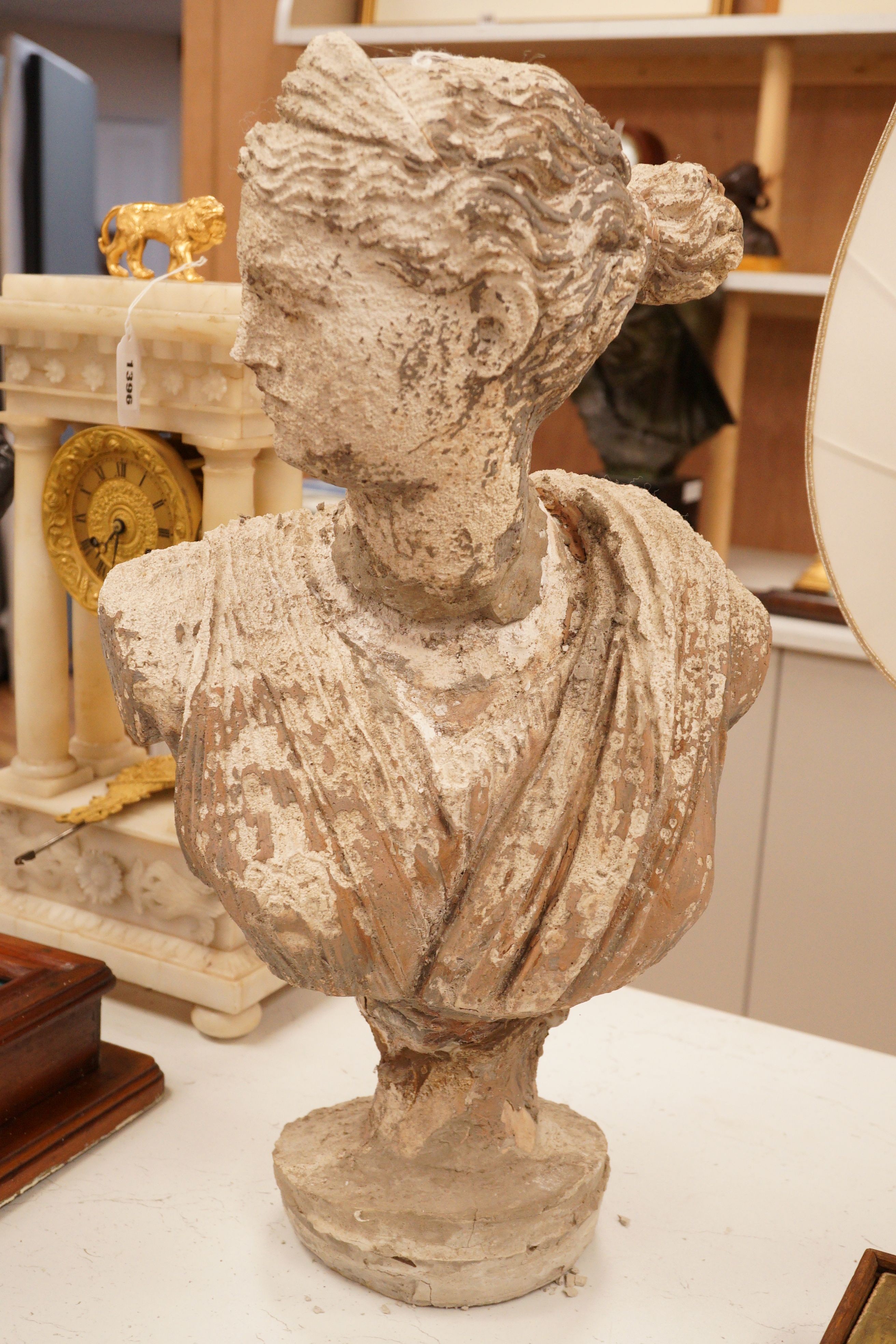A reconstituted bust of a classical figure, 54cm tall